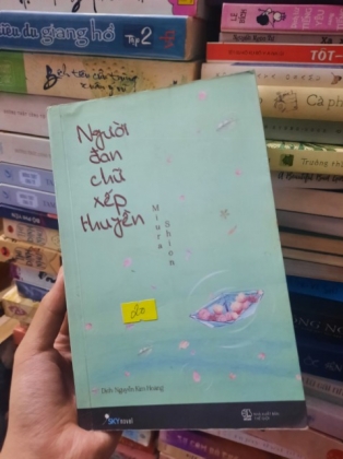 NGƯỜI ĐAN CHỮ XẾP HUYỀN 